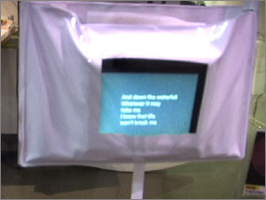 Lyrics to warble along come up on your water-proof screen.